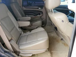 2015 Chevrolet Tahoe LTZ z VIN 1GNSCCKC8FR102859, wystawiony jako Copart lot #56755555 z przebiegiem 167 191 mil mil oraz Czysty tytuł • Clean title. Historia ofert i sprzedaży dostępna na DreamBid. Obrazek 11.