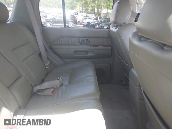 2002 Infiniti QX4 with VIN JNRDR09X52W213906, listed as a IAAI auction lot 41985589 with 166,733 mi miles and . Bid and sale history available at DreamBid. Image 8.