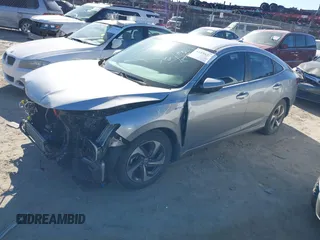 2019 Honda Insight EX with VIN 19XZE4F58KE032529, listed as a IAAI auction lot 41856313 with 59,109 mi miles and . Bid and sale history available at carsss.com. Image 18.