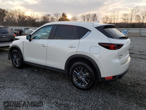 2020 Mazda CX-5 Touring with VIN JM3KFACM0L0863937, listed as a Copart auction lot 48240655 with 70,592 mi miles and Salvage Title. Bid and sale history available at carsss.com. Image 2.