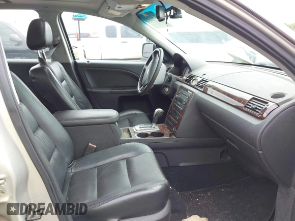 2007 Ford Five Hundred Limited с VIN 1FAHP28147G124688, выставлен на аукционе IAAI как лот 42343568 с пробегом 170 197 миль миль и . История ставок и продаж доступна на DreamBid. Изображение 5.