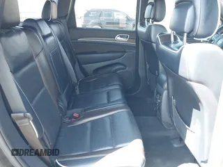 2015 Jeep Grand Cherokee Overland with VIN 1C4RJECG3FC635327, listed as a IAAI auction lot 41910559 with 118,519 mi miles and . Bid and sale history available at DreamBid. Image 8.