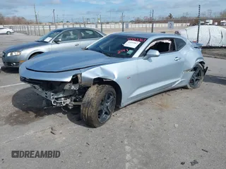 2017 Chevrolet Camaro 1LT with VIN 1G1FB1RX4H0184633, listed as a IAAI auction lot 41453367 with 141,018 mi miles and . Bid and sale history available at carsss.com. Image 2.