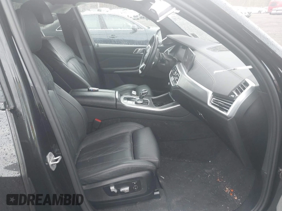 2023 BMW X5 xDrive40i with VIN 5UXCR6C01P9S01895, listed as a IAAI auction lot 41905192 with 33,326 mi miles and . Bid and sale history available at DreamBid. Image 5.