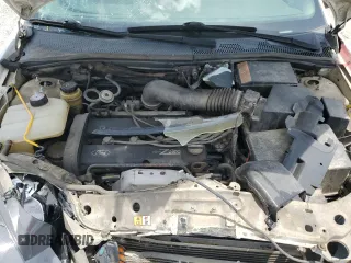 2003 Ford Focus ZX3 with VIN 3FAFP31383R117755, listed as a Copart auction lot 60668725 with 135,856 mi miles and Salvage title. Bid and sale history available at DreamBid. Image 11.