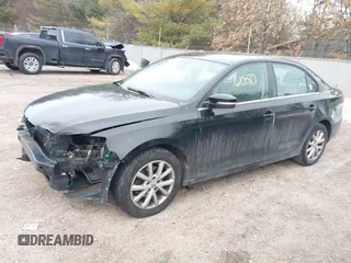 2013 Volkswagen Jetta SE with VIN 3VWDP7AJ1DM288236, listed as a IAAI auction lot 41706050 with 156,898 mi miles and . Bid and sale history available at DreamBid. Image 2.