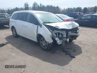 2012 Honda Odyssey EX-L with VIN 5FNRL5H65CB082916, listed as a IAAI auction lot 42052713 with 217,267 mi miles and . Bid and sale history available at carsss.com. Image 1.