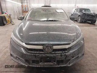 2018 Honda Clarity Touring z VIN JHMZC5F39JC002521, wystawiony jako IAAI lot #41428968 z przebiegiem 64 014 mil mil oraz . Historia ofert i sprzedaży dostępna na DreamBid. Obrazek 13.