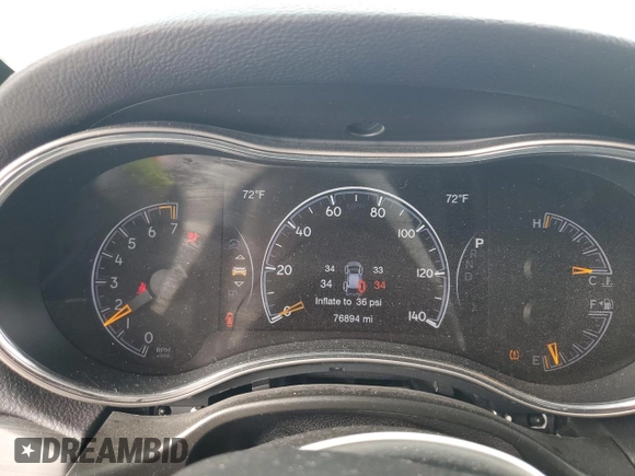 2020 Jeep Grand Cherokee Altitude with VIN 1C4RJFAG0LC150082, listed as a Copart auction lot 52899985 with 76,894 mi miles and Salvage Title. Bid and sale history available at carsss.com. Image 9.