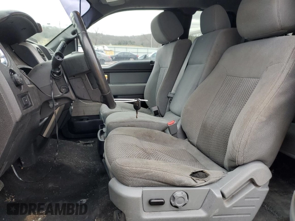 2014 Ford F-150 XL with VIN 1FTFX1ET9EFB82879, listed as a Copart auction lot 49855315 with 142,217 mi miles and Salvage title. Bid and sale history available at DreamBid. Image 7.