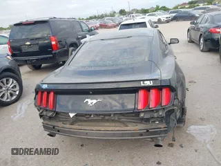 2016 Ford Mustang EcoBoost z VIN 1FA6P8THXG5267039, wystawiony jako IAAI lot #42014319 z przebiegiem 103 936 mil mil oraz . Historia ofert i sprzedaży dostępna na DreamBid. Obrazek 17.