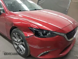 2016 Mazda 6 i Grand Touring с VIN JM1GJ1W50G1474054, выставлен на аукционе IAAI как лот 42162163 с пробегом 97 169 миль миль и . История ставок и продаж доступна на DreamBid. Изображение 6.