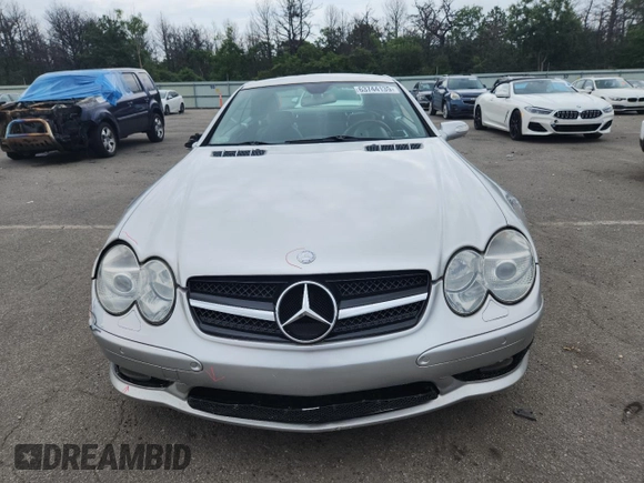 2005 Mercedes-Benz SL 500 with VIN WDBSK75F65F093215, listed as a Copart auction lot 63744135 with 94,645 mi miles and Salvage title. Bid and sale history available at DreamBid. Image 5.