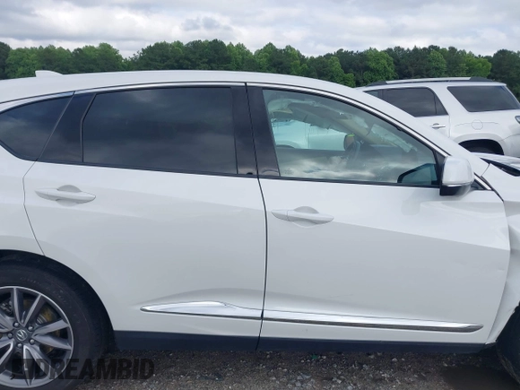 2020 Acura RDX Advance with VIN 5J8TC2H79LL033018, listed as a IAAI auction lot 42331295 with 53,015 mi miles and . Bid and sale history available at DreamBid. Image 13.