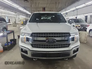 2018 Ford F-150 XL with VIN 1FTEW1E59JKD11351, listed as a IAAI auction lot 42663848 with 128,761 mi miles and . Bid and sale history available at DreamBid. Image 31.