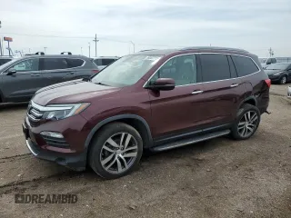 2017 Honda Pilot Touring with VIN 5FNYF6H94HB054499, listed as a Copart auction lot 59387715 with 108,514 mi miles and Salvage title. Bid and sale history available at DreamBid. Image 1.