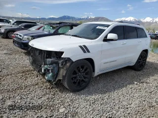 2015 Jeep Grand Cherokee Summit with VIN 1C4RJFJG1FC711412, listed as a Copart auction lot 52747885 with 185,286 mi miles and Salvage title. Bid and sale history available at DreamBid. Image 1.