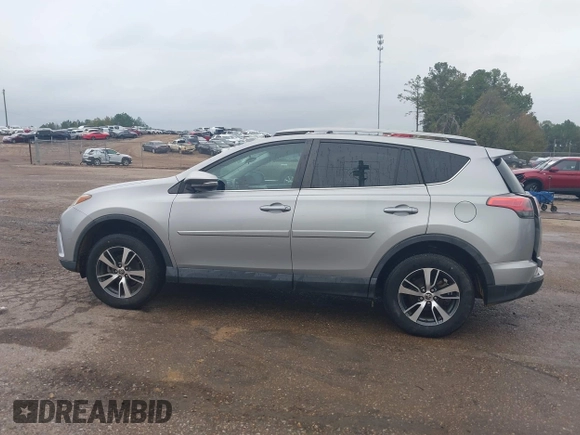 2018 Toyota RAV4 XLE with VIN 2T3WFREV3JW445654, listed as a IAAI auction lot 40849666 with 69,365 mi miles and . Bid and sale history available at DreamBid. Image 14.