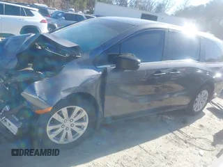 2021 Honda Odyssey LX с VIN 5FNRL6H26MB002074, выставлен на аукционе IAAI как лот 41155572 с пробегом Не указан миль и . История ставок и продаж доступна на DreamBid. Изображение 15.