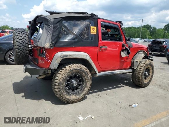 2014 Jeep Wrangler Sport with VIN 1C4AJWAG4EL205584, listed as a Copart auction lot 63671245 with Not provided miles and Salvage title. Bid and sale history available at DreamBid. Image 3.