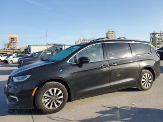 2021 Chrysler Pacifica Hybrid Touring L with VIN 2C4RC1L76MR578340, listed as a Copart auction lot 54748445 with 137,390 mi miles and Salvage title. Bid and sale history available at DreamBid. Image 1.