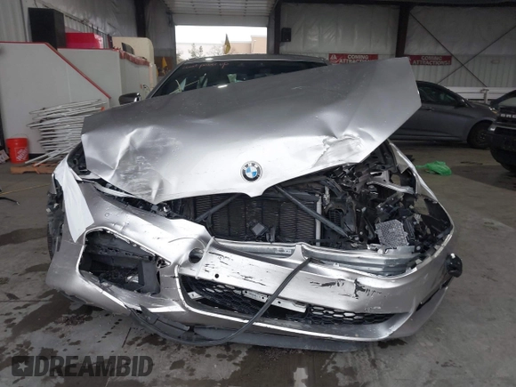 2020 BMW 5 Series M550i xDrive z VIN WBAJS7C07LCD85532, wystawiony jako IAAI lot #41518071 z przebiegiem 57 645 mil mil oraz . Historia ofert i sprzedaży dostępna na DreamBid. Obrazek 6.