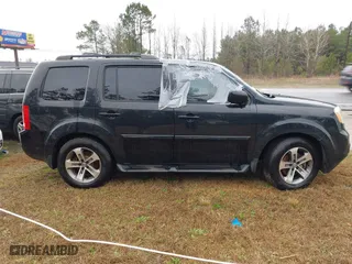 2015 Honda Pilot SE with VIN 5FNYF3H39FB010277, listed as a IAAI auction lot 41557471 with 137,972 mi miles. Bid and sale history available at carsss.com. Image 13.