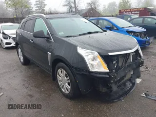 2014 Cadillac SRX Luxury Collection z VIN 3GYFNEE32ES643679, wystawiony jako IAAI lot #42172274 z przebiegiem 122 276 mil mil oraz . Historia ofert i sprzedaży dostępna na DreamBid. Obrazek 1.