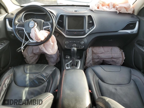 2014 Jeep Cherokee Trailhawk with VIN 1C4PJMBS5EW160669, listed as a Copart auction lot 82000703 with Not provided miles and Salvage title. Bid and sale history available at DreamBid. Image 8.