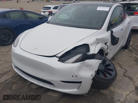 2022 Tesla Model Y Performance with VIN 7SAYGDEF0NF400560, listed as a IAAI auction lot 41783912 with 36,513 mi miles and . Bid and sale history available at DreamBid. Image 6.
