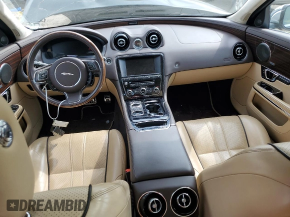 2014 Jaguar XJ Portfolio with VIN SAJWJ2GD4E8V70170, listed as a Copart auction lot 69662054 with 121,188 mi miles and Non repairable. Bid and sale history available at DreamBid. Image 8.