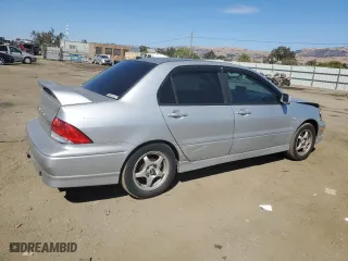 2003 Mitsubishi Lancer OZ-Rally with VIN JA3AJ86E43U048700, listed as a Copart auction lot 73719154 with 178,121 mi miles and Salvage Title. Bid and sale history available at carsss.com. Image 3.
