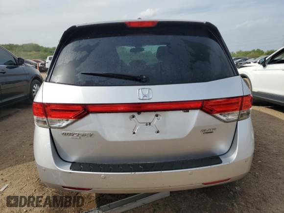 2014 Honda Odyssey Touring with VIN 5FNRL5H93EB034263, listed as a Copart auction lot 57254485 with 150,084 mi miles and Salvage title. Bid and sale history available at DreamBid. Image 6.