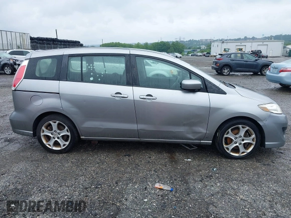 2010 Mazda 5 Sport with VIN JM1CR2WL9A0375192, listed as a IAAI auction lot 42621634 with 130,076 mi miles and . Bid and sale history available at DreamBid. Image 6.