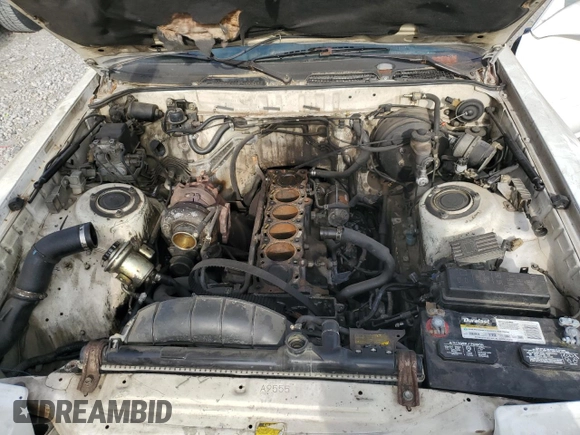 1989 Toyota Supra z VIN JT2MA71J5K0116367, wystawiony jako Copart lot #71280374 z przebiegiem Nie podano mil oraz Szkoda całkowita • Salvage title. Historia ofert i sprzedaży dostępna na DreamBid. Obrazek 11.