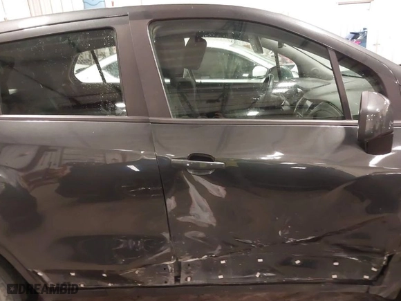2019 Chevrolet Trax LS with VIN 3GNCJKSB4KL214510, listed as a IAAI auction lot 40640607 with 128,037 mi miles. Bid and sale history available at carsss.com. Image 14.