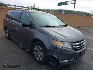 2016 Honda Odyssey SE with VIN 5FNRL5H30GB034980, listed as a IAAI auction lot 41512117 with 97,644 mi miles. Bid and sale history available at carsss.com. Image 1.