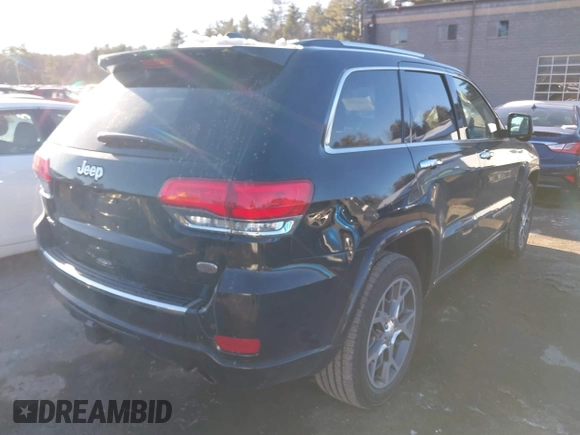 2021 Jeep Grand Cherokee Overland with VIN 1C4RJFCG3MC601150, listed as a IAAI auction lot 41421403 with 165,614 mi miles and . Bid and sale history available at DreamBid. Image 4.