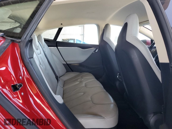 2013 Tesla Model S with VIN 5YJSA1AG5DFP12177, listed as a Copart auction lot 61846195 with 130,668 mi miles and Salvage title. Bid and sale history available at DreamBid. Image 10.