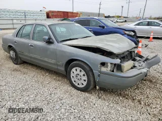 2004 Mercury Grand Marquis GS with VIN 2MEFM74W44X659873, listed as a Copart auction lot 51793205 with 115,384 mi miles and Salvage Title. Bid and sale history available at DreamBid. Image 4.