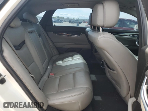 2013 Cadillac XTS Luxury with VIN 2G61R5S31D9100234, listed as a Copart auction lot 50174175 with 98,600 mi miles and Salvage title. Bid and sale history available at DreamBid. Image 10.