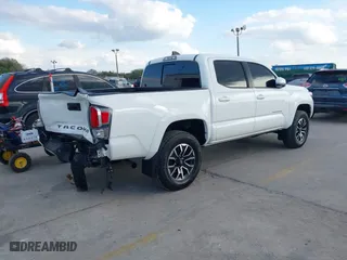 2023 Toyota Tacoma 4WD SR with VIN 3TMCZ5AN9PM566739, listed as a IAAI auction lot 41513763 with 16,708 mi miles. Bid and sale history available at carsss.com. Image 4.