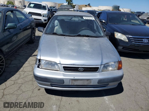 1995 Toyota Tercel DX z VIN JT2EL56E7S7011335, wystawiony jako Copart lot #67978774 z przebiegiem 182 025 mil mil oraz Szkoda całkowita • Salvage title. Historia ofert i sprzedaży dostępna na DreamBid. Obrazek 5.