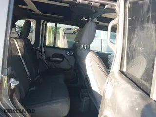 2019 Jeep Wrangler Unlimited Sport with VIN 1C4HJXDG9KW558672, listed as a IAAI auction lot 41218292 with 61,057 mi miles. Bid and sale history available at carsss.com. Image 8.