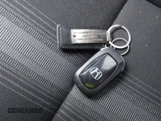 2024 Honda Civic Sport with VIN 2HGFE2F51RH594148, listed as a IAAI auction lot 41304184 with 11,307 mi miles and . Bid and sale history available at DreamBid. Image 11.