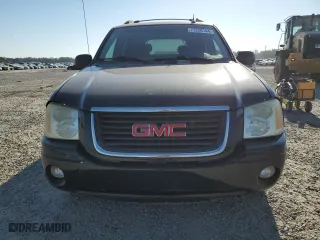 2005 GMC Envoy XL SLT with VIN 1GKET16S256109757, listed as a Copart auction lot 77220144 with 246,444 mi miles and Salvage Title. Bid and sale history available at carsss.com. Image 5.