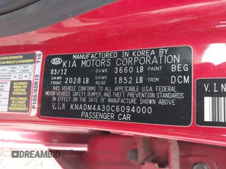 2012 Kia Rio LX with VIN KNADM4A30C6094000, listed as a IAAI auction lot 42059778 with 127,957 mi miles. Bid and sale history available at carsss.com. Image 9.