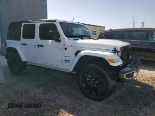 2023 Jeep Wrangler Sahara z VIN 1C4JJXP6XPW696247, wystawiony jako Copart lot #54222575 z przebiegiem 39 797 mil mil oraz Nie do naprawy • Non repairable. Historia ofert i sprzedaży dostępna na DreamBid. Obrazek 4.