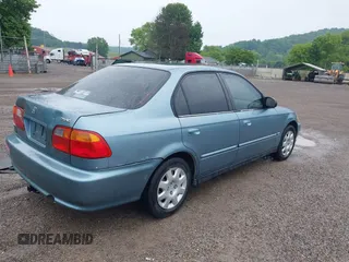 2000 Honda Civic VP z VIN 2HGEJ6612YH575604, wystawiony jako IAAI lot #42395535 z przebiegiem 164 185 mil mil oraz . Historia ofert i sprzedaży dostępna na DreamBid. Obrazek 4.
