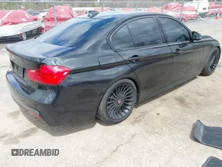 2015 BMW 3 Series 328i xDrive with VIN WBA3B5G54FNS12740, listed as a IAAI auction lot 42035935 with 77,455 mi miles and . Bid and sale history available at DreamBid. Image 4.